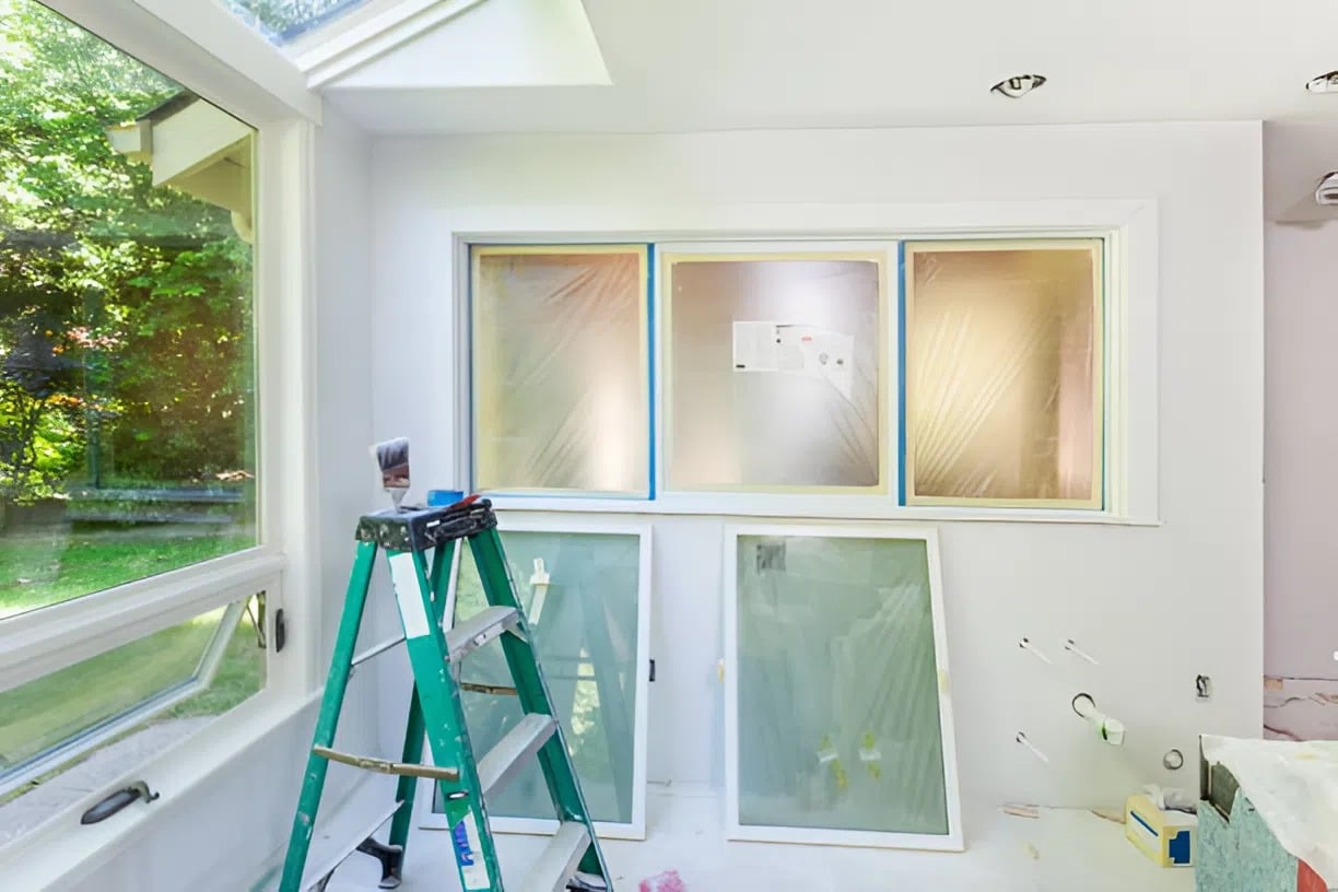 Preparation with taped windows and protected surfaces, showcasing prep work by an interior painter in Ashland, VA