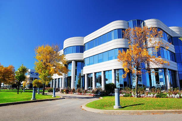 Commercial office building with clean white exterior finishes by an exterior painter in Richmond, VA.