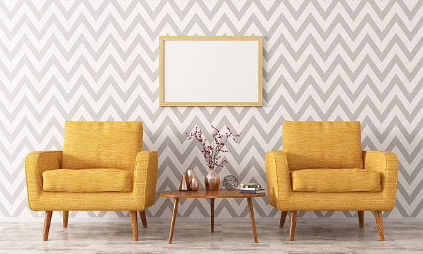 Gray and white chevron wallpaper creating a contemporary accent wall by an interior painter in Richmond, VA.